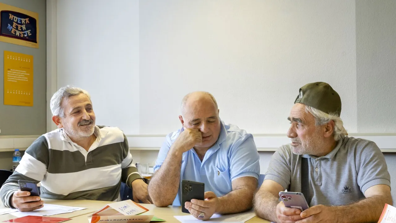 Mannen tijdens cursus digiklik