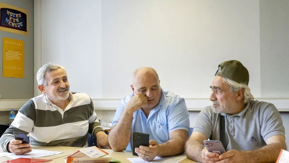 Mannen tijdens cursus digiklik